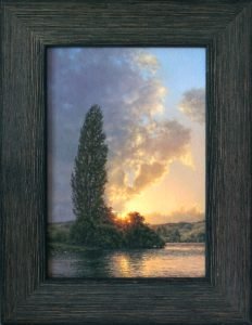 Painting of a tree and lake at sunset