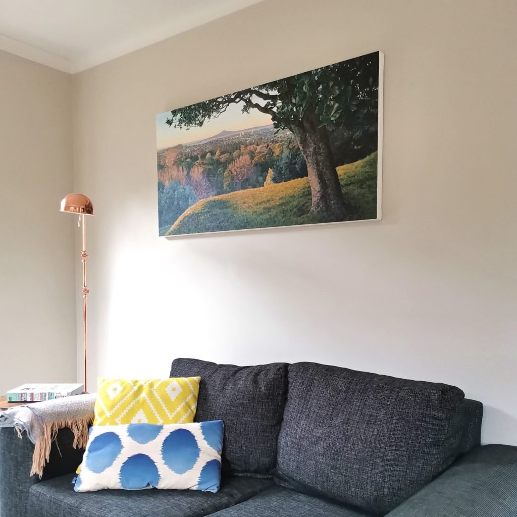 Commission painting of One Tree Hill on the wall in the living room